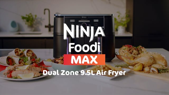 Video of Ninja AF400UK air fryer with both drawers open showing food inside